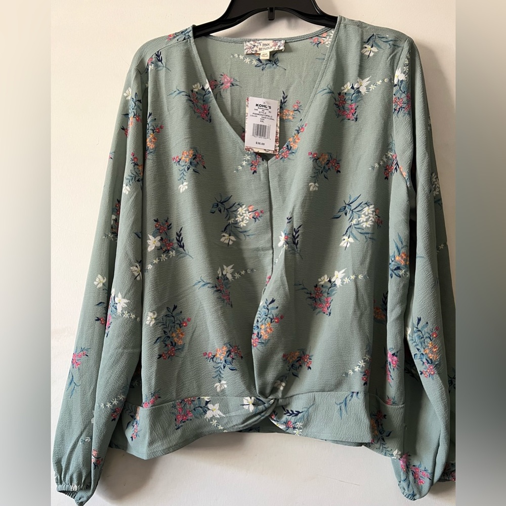 NWT beautiful teal blue floral blouse.